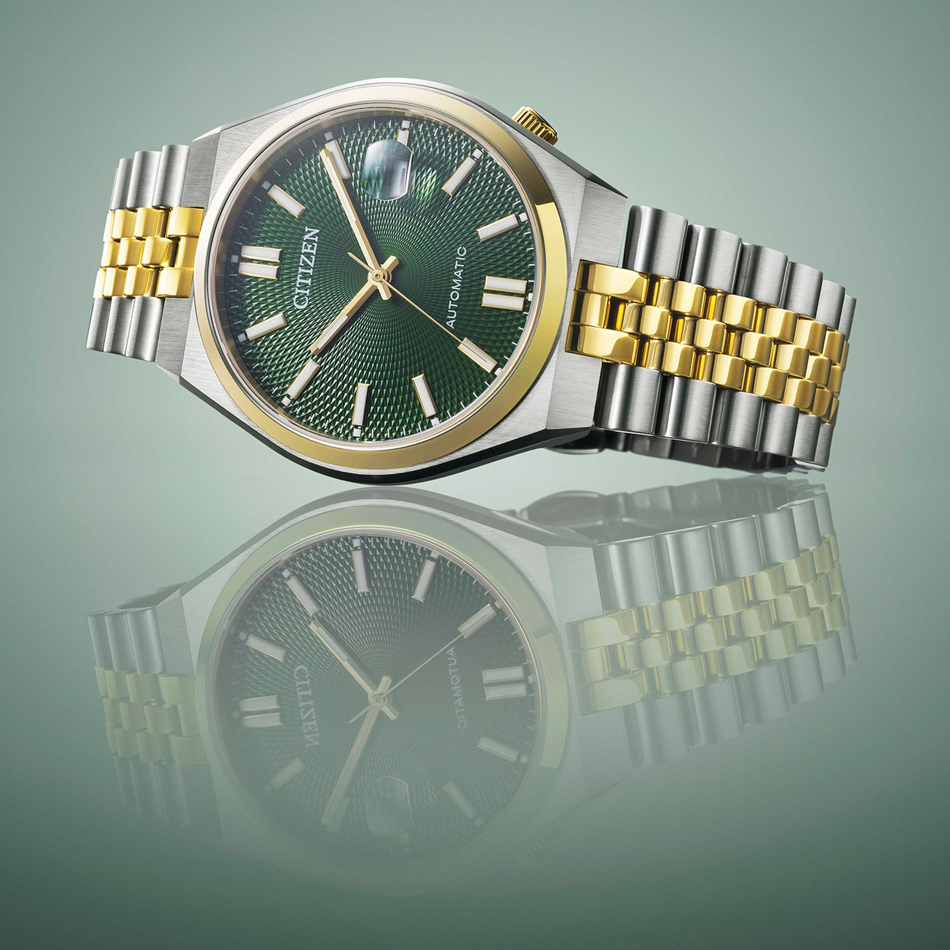 Citizen horloge met groene wijzerplaat en gouden en zilveren band