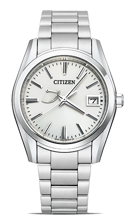 Citizen horloge met zilveren band en witte wijzerplaat, datumweergave.