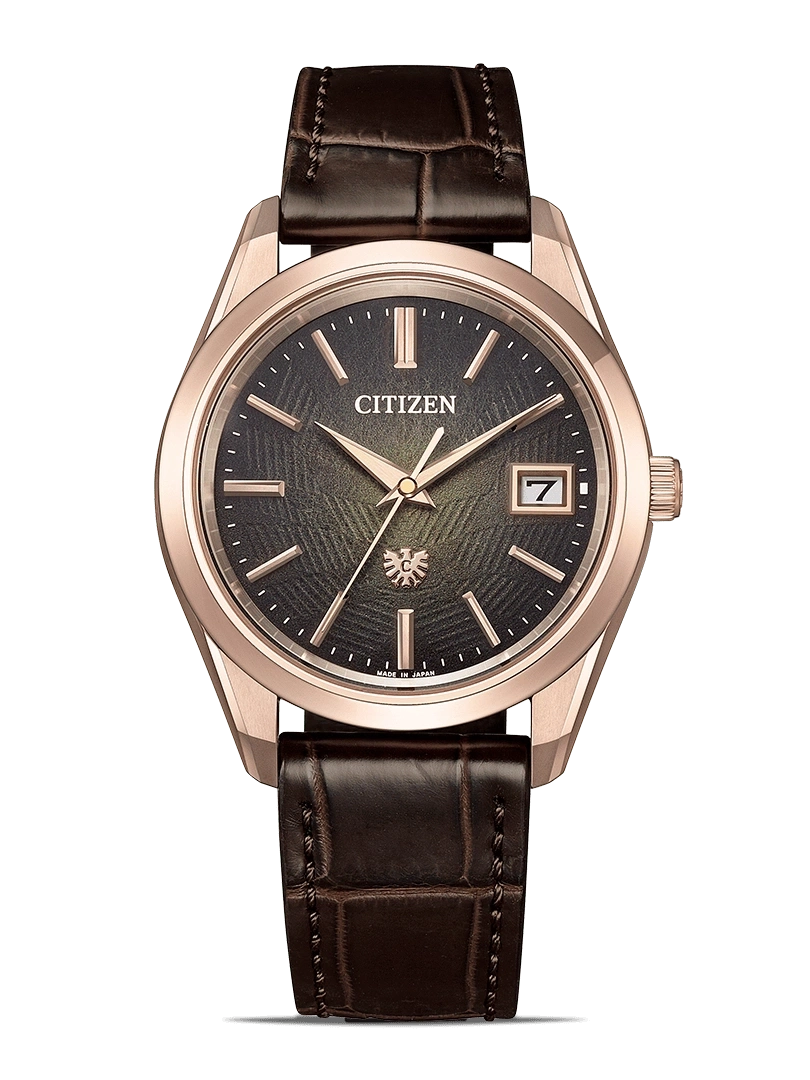 Citizen horloge met bruine leren band en roségouden kast.