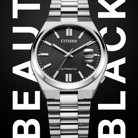 Citizen horloge met zwarte wijzerplaat, zilveren band en de woorden BEAUTY BLACK.