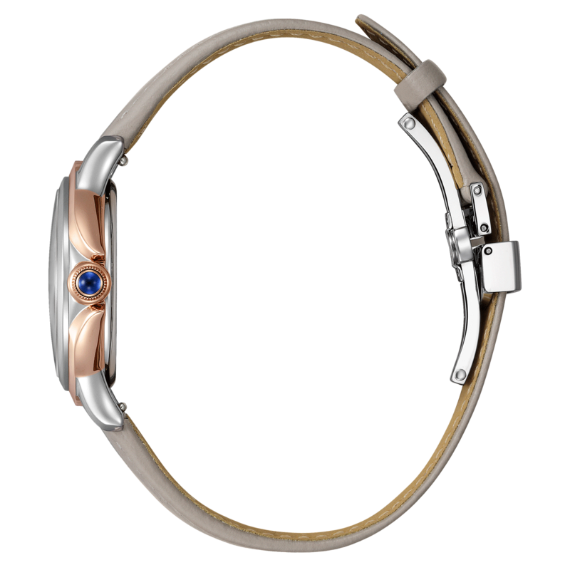 Zijaanzicht van een zilveren en roségouden horloge met een grijze leren band.