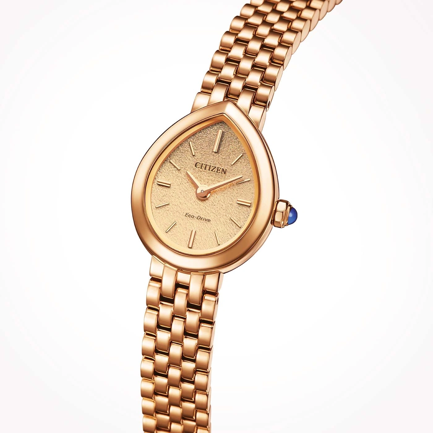 Een roségouden Citizen horloge met een druppelvormige wijzerplaat en blauwe accenten.