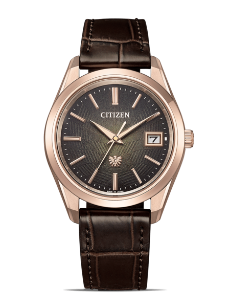 Citizen horloge met bruine leren band en roségouden kast.