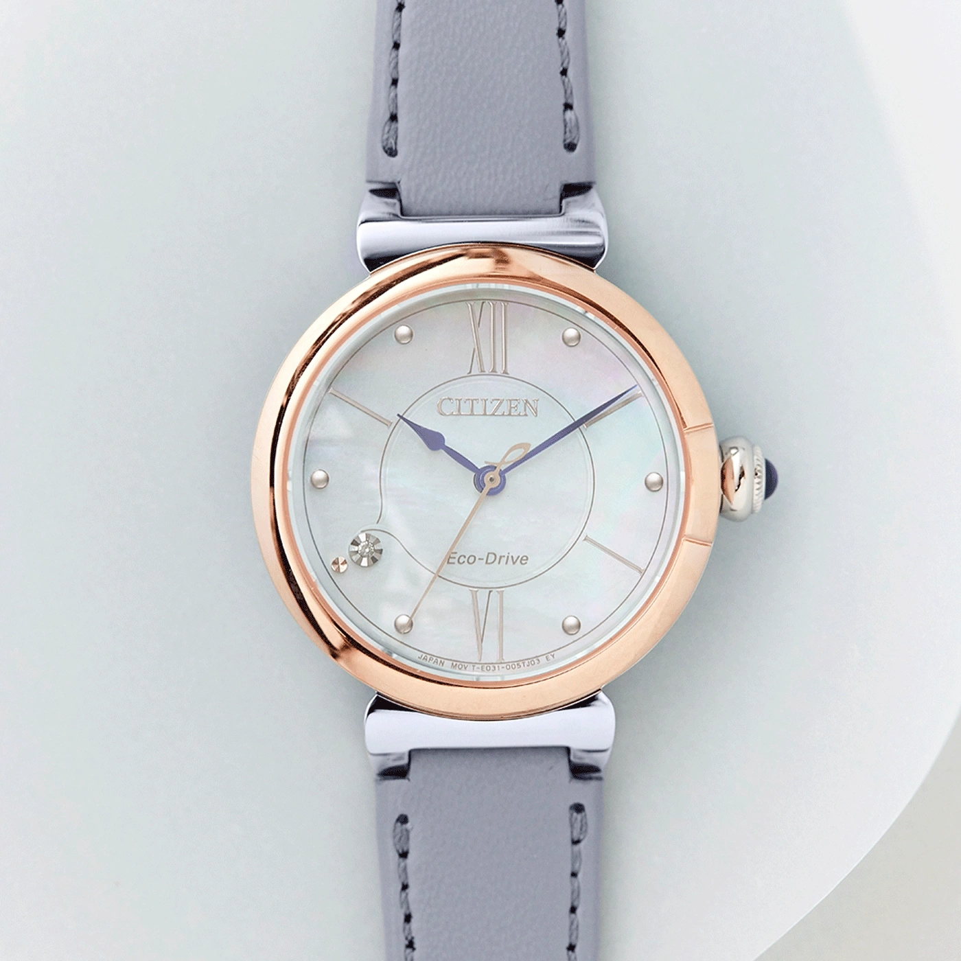 Citizen horloge met roségouden bezel en grijze leren band