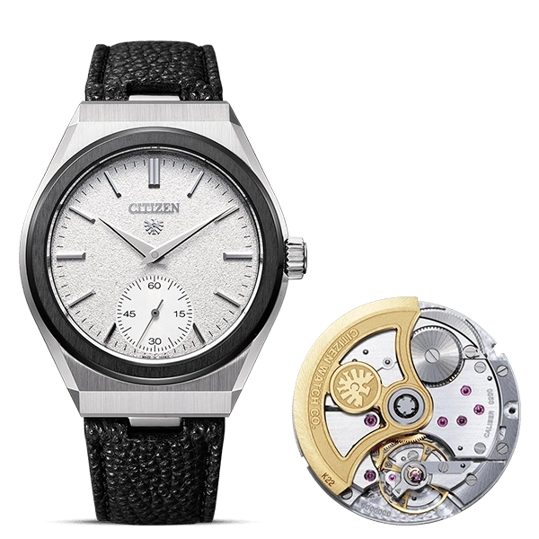Citizen horloge met zwarte band en het interne mechanisme.