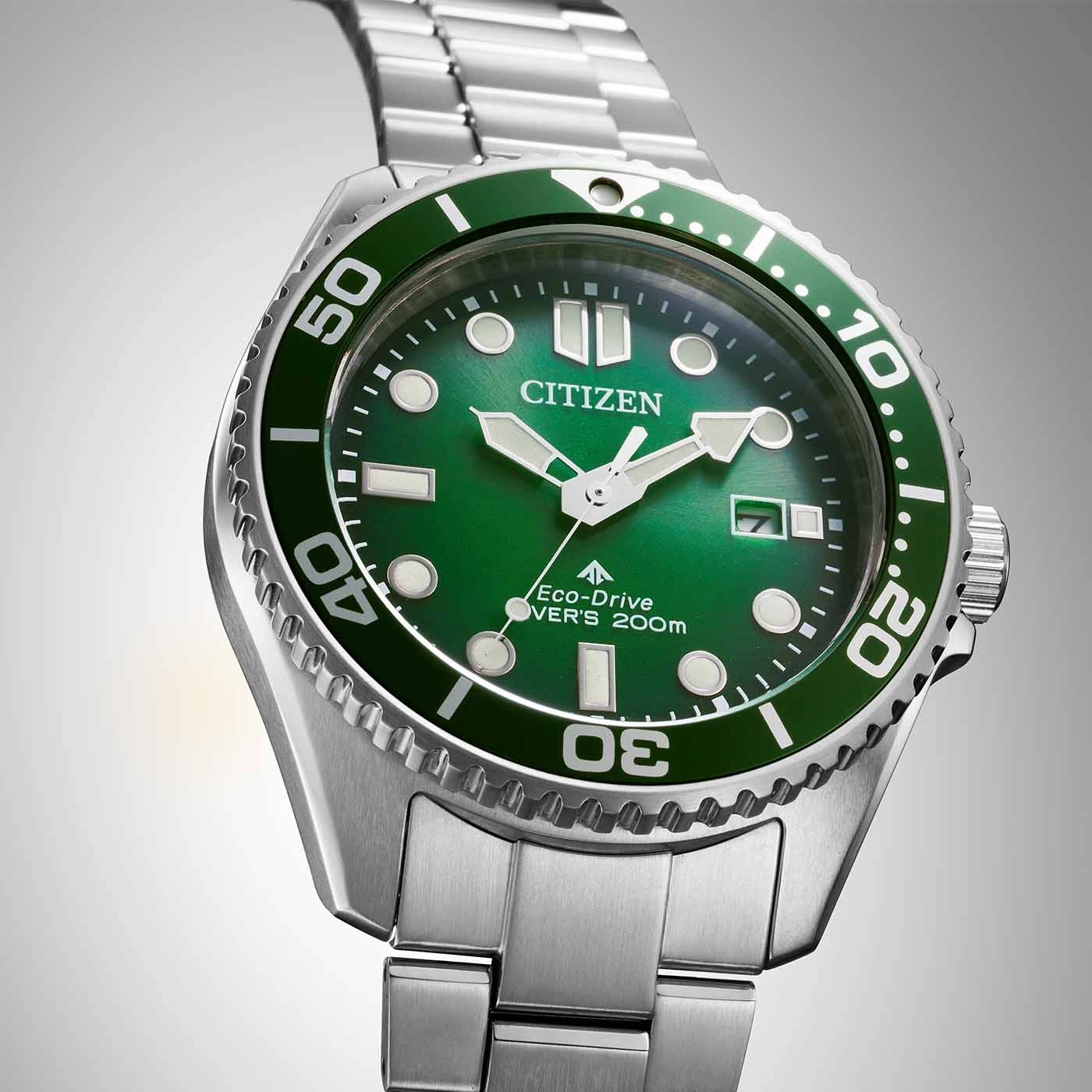 Citizen horloge met groene wijzerplaat en bezel, roestvrijstalen armband