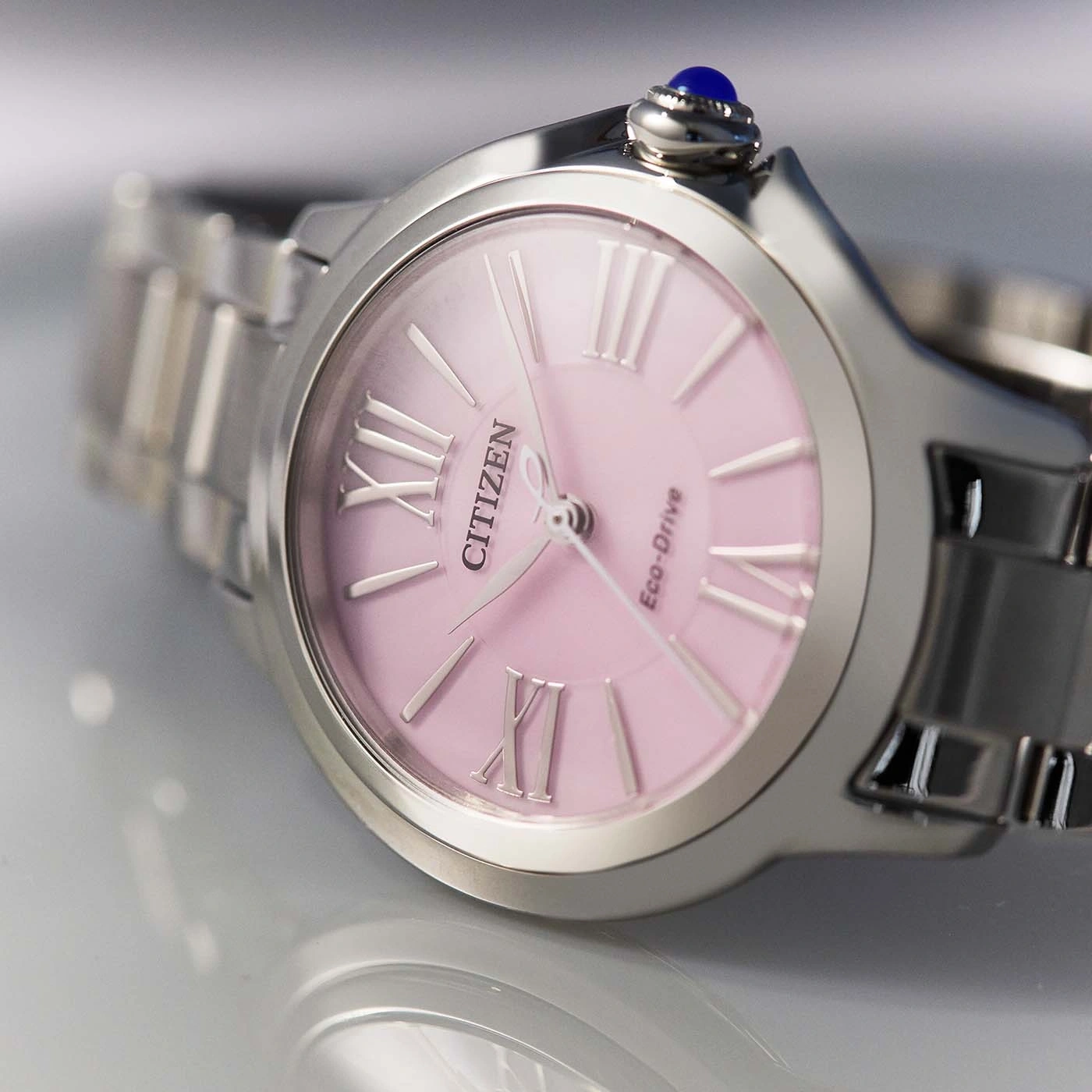 Citizen horloge met roze wijzerplaat en zilveren band, Romeinse cijfers, Eco-Drive.