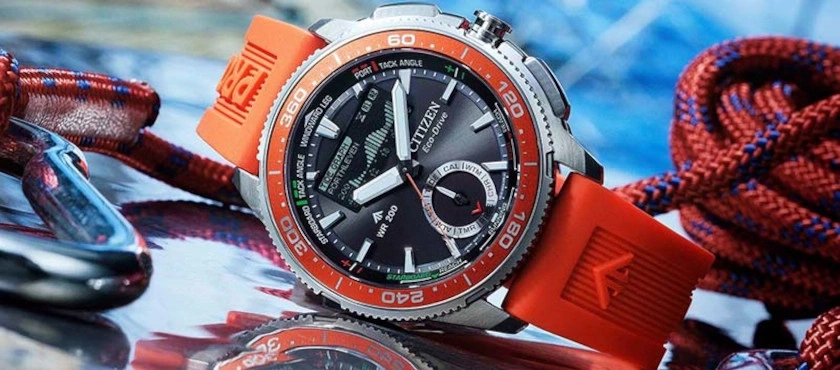 Citizen Eco-Drive horloge met oranje band en touwen.