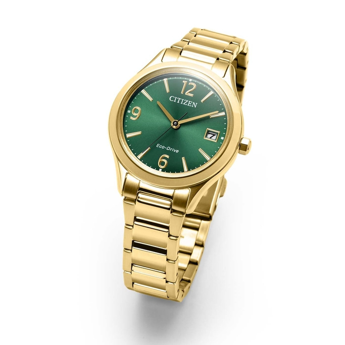 Een gouden Citizen Eco-Drive horloge met een groen wijzerplaat.