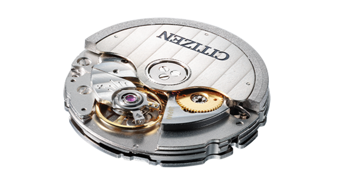 Close-up van een Citizen horlogemechanisme met ingewikkelde tandwielen en details.