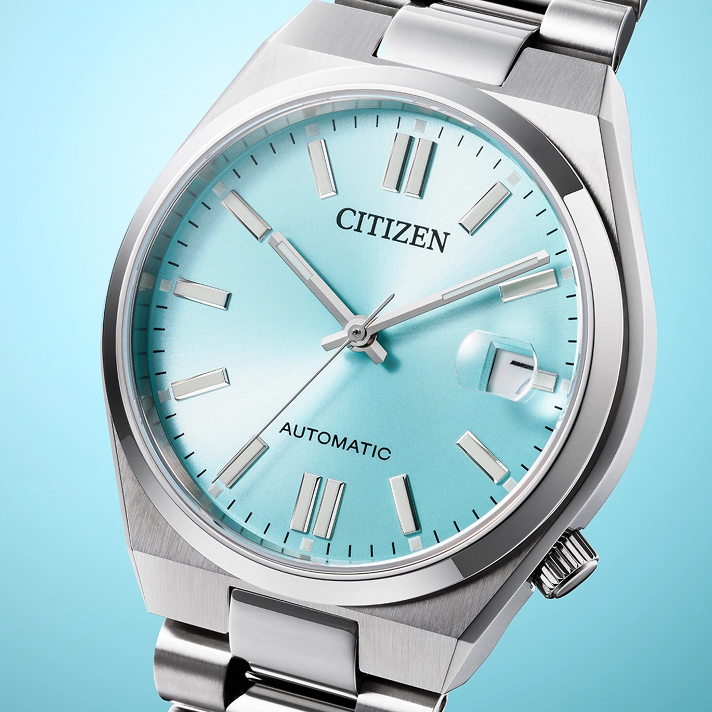 Citizen horloge met lichtblauwe wijzerplaat en zilveren band, automatisch.