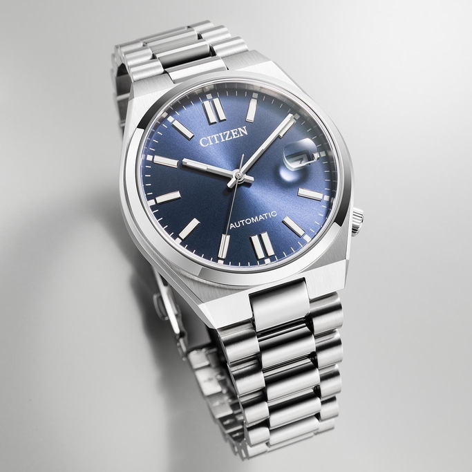 Citizen automatisch horloge met blauwe wijzerplaat en zilveren armband.