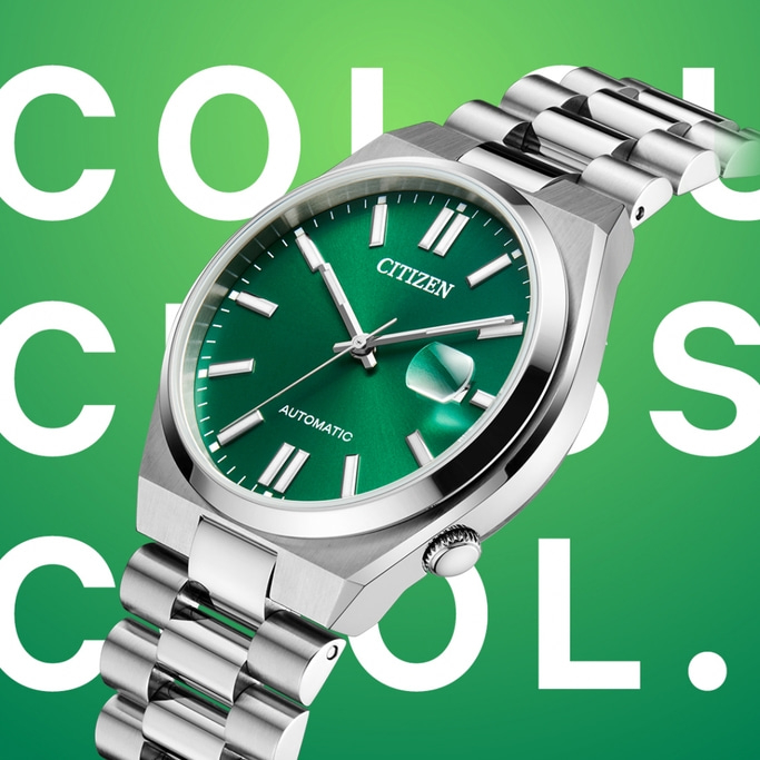 Citizen horloge met groene wijzerplaat en zilveren band, cool design.